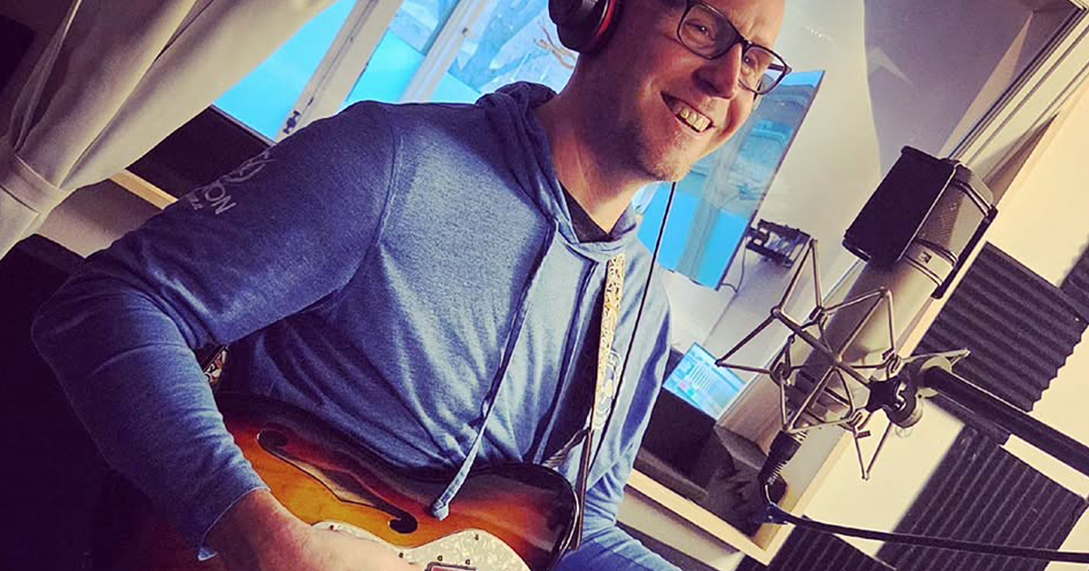 Musician Playing Electric Guitar With U87 Mic In Chicago Music Studio
