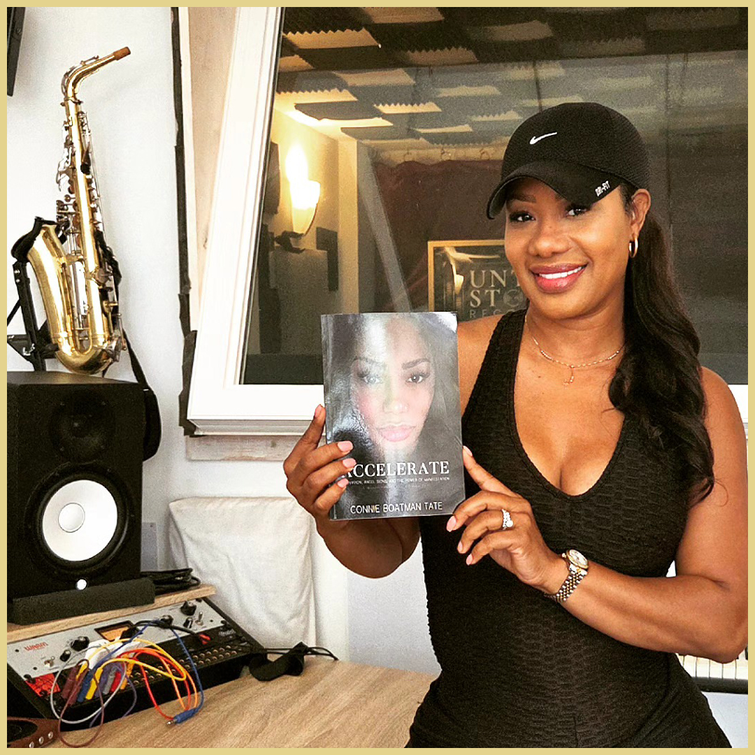 Woman Holding Audiobook She Recorded In Chicago Recording Studio